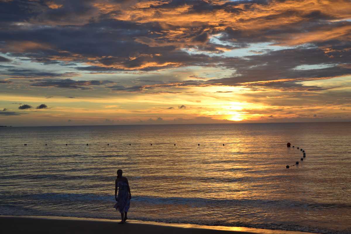 Stroll Mirissa Beach at sunset